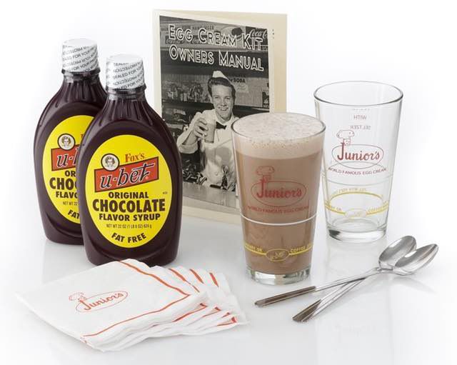 Genuine Brooklyn Egg Cream KitEgg Creams are part of NYC's history, and while they are best served straight out of a place like Gem Spa, if you need an Egg Cream in a pinch, you're gonna need your Egg Cream Kit on you. Luckily, those exist, and this one comes with Fox's U-Bet Chocolate Syrup and two authentic fountain glasses from Junior's of Brooklyn.